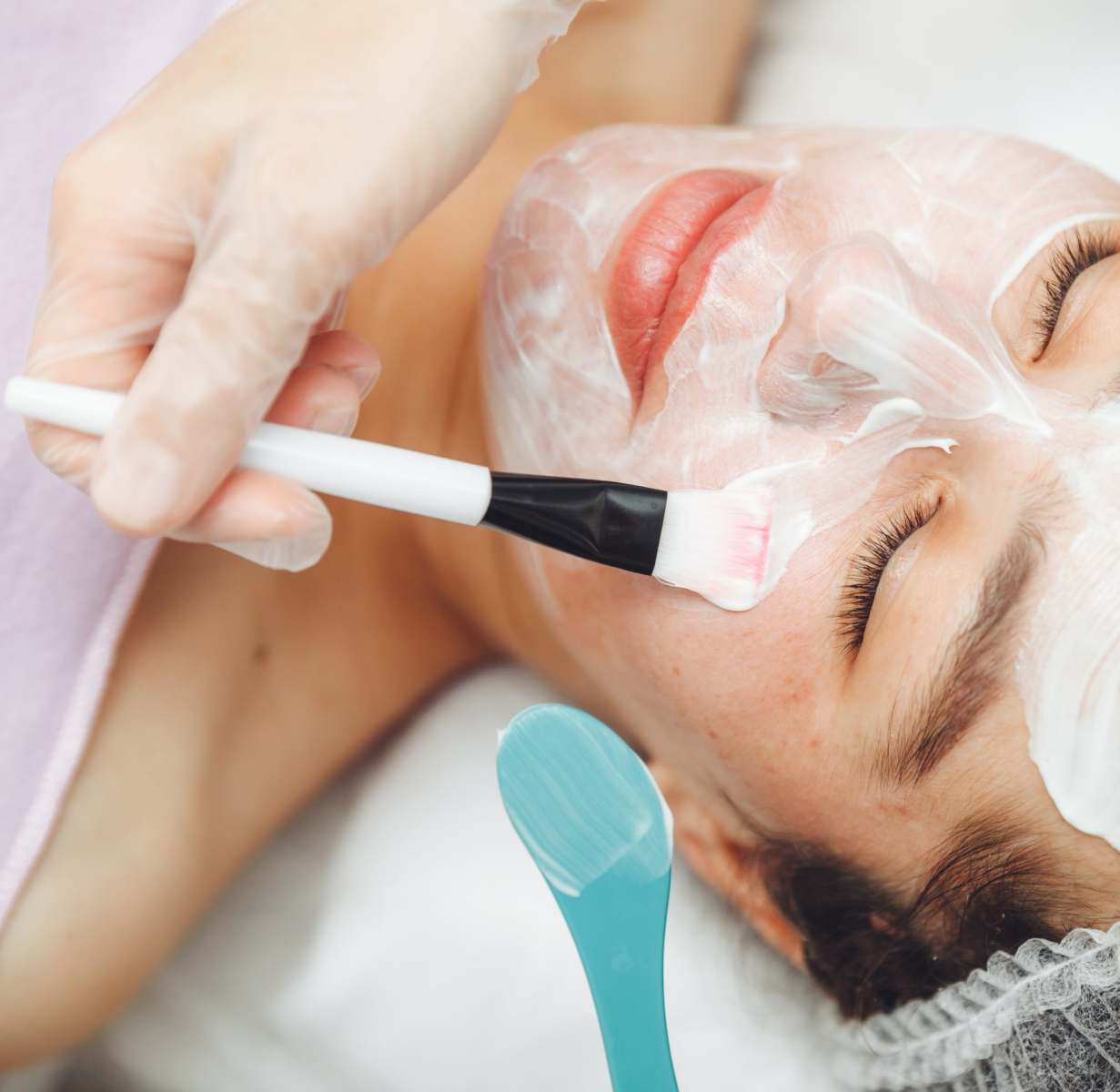 a-cosmetologist-does-facial-care-and-apply-a-face-2023-11-27-04-56-14-utc (1)